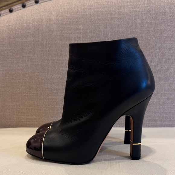 CHANEL Black Leather Heeled Boots with Gold Accents - Picture 4 of 7